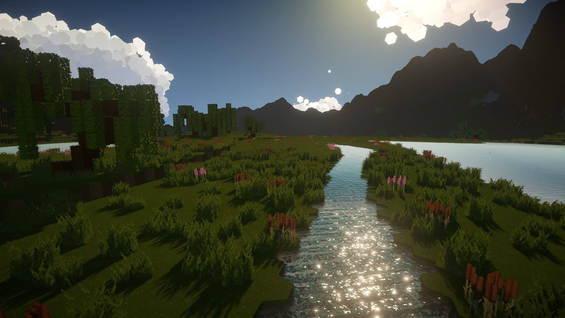 A river valley leading to a mountain lake